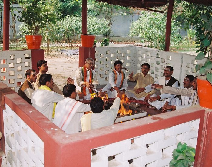 Vedic Life Foundation Pandits, with Pandit Dixit at the center, performing a Homam, 2008